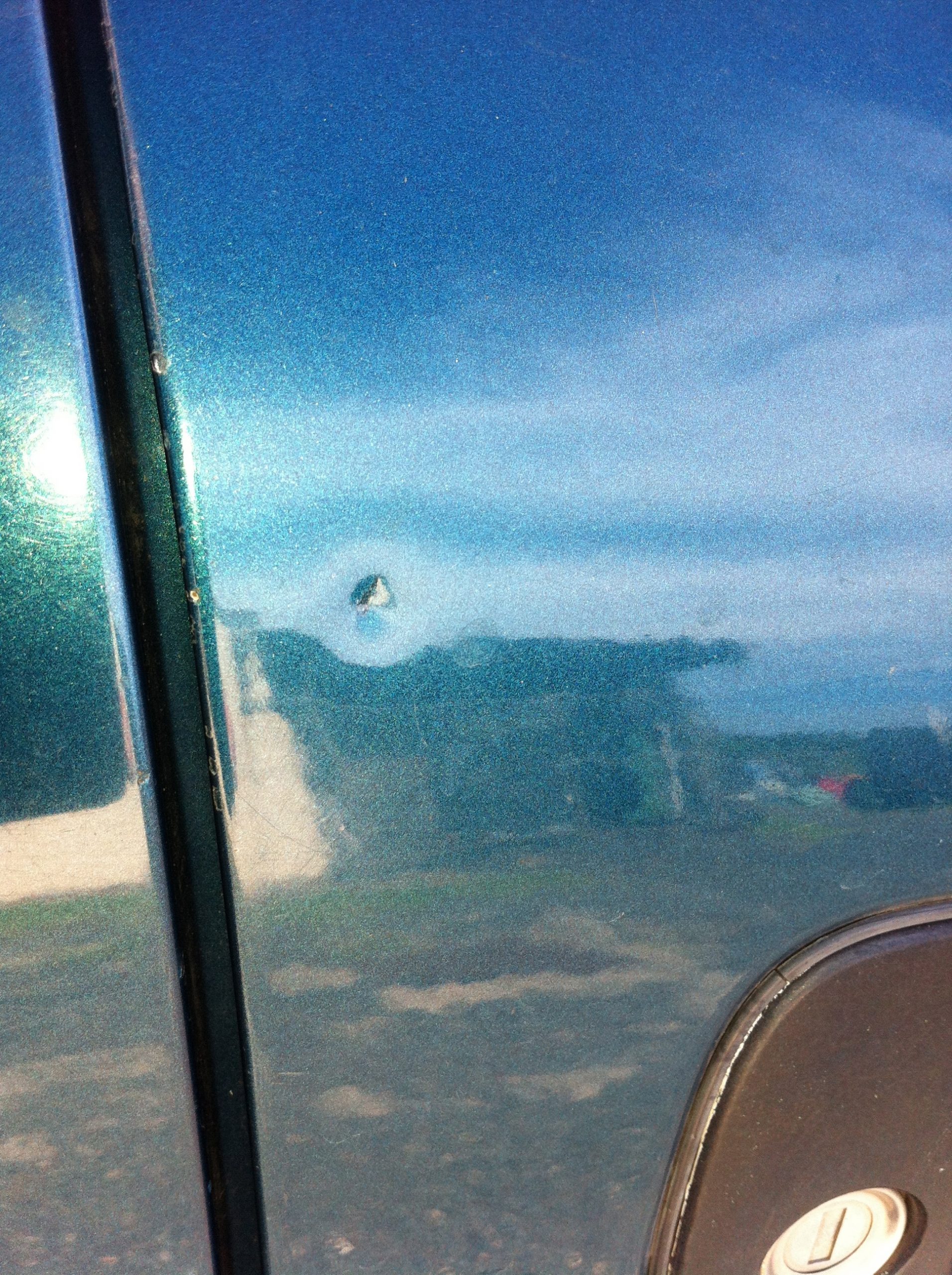 A dent shown in the reflection