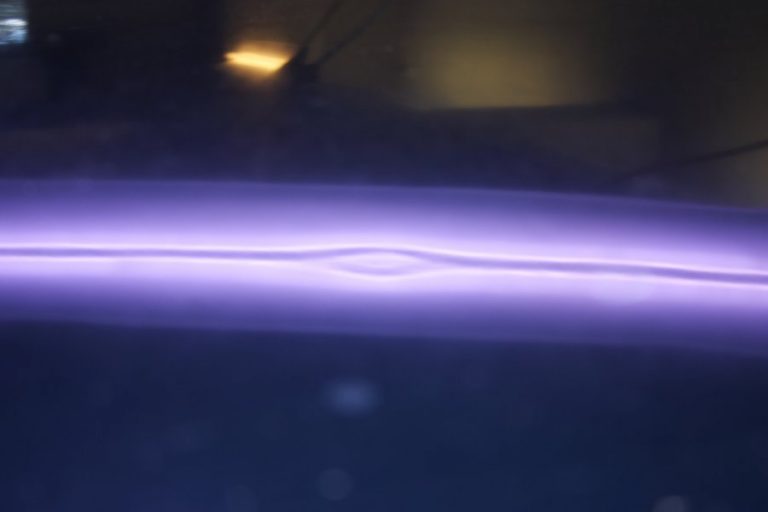 A small dent seen in the reflection